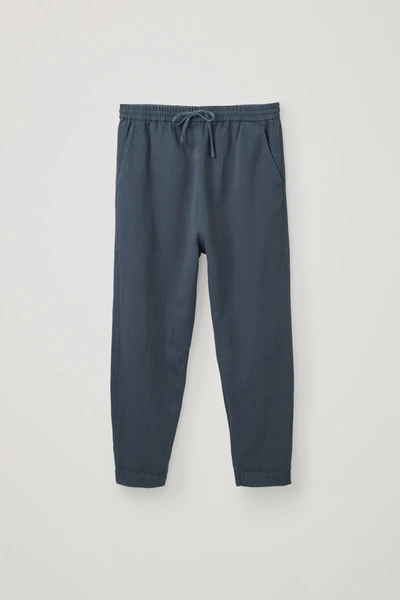 Shop Cos Relaxed Joggers In Blue