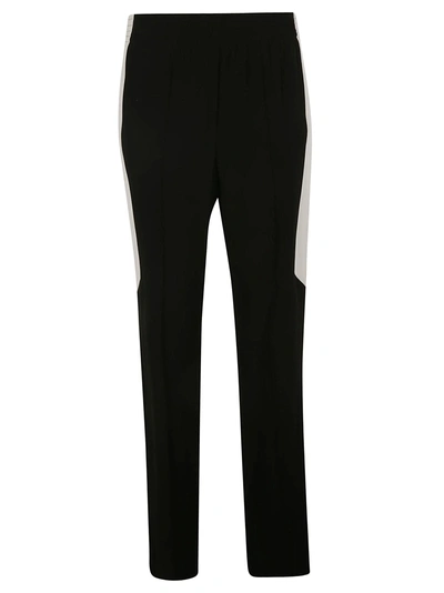 Shop Givenchy Side Stripe Trousers In Black