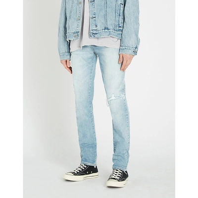 Shop Ksubi Chitch Distressed Slim-fit Tapered Jeans In The Streets