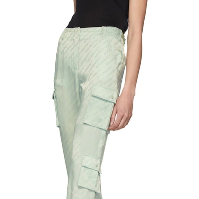 Shop Off-white Green Logo Trousers In Light Green