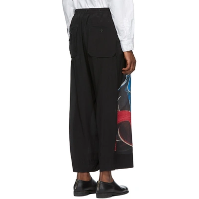 Shop Yohji Yamamoto Black Pocket Girl Print Trousers