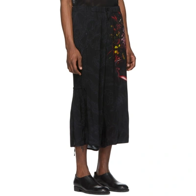 Shop Yohji Yamamoto Black Woman Baty Print Trousers