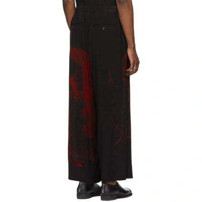 Shop Yohji Yamamoto Black And Red Print Trousers