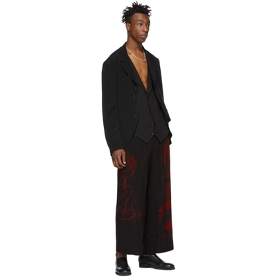 Shop Yohji Yamamoto Black And Red Print Trousers