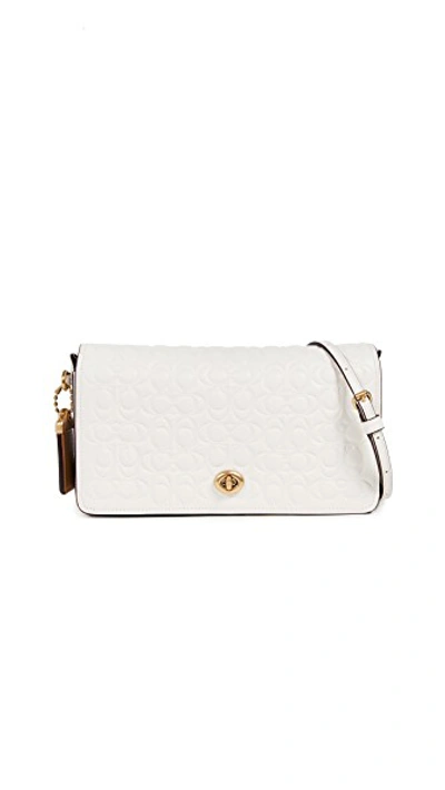 Shop Coach Signature Leather Dinky Crossbody With Leather Strap In Chalk