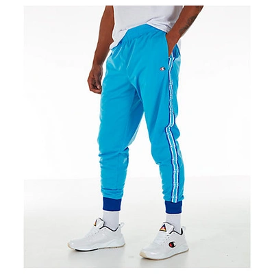 Shop Champion Men's Side Tape Track Jogger Pants In Blue Size Large