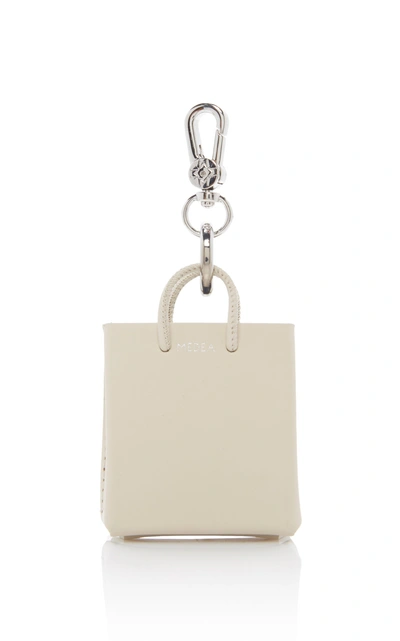 Shop Medea Sisters Prima Mini Leather Keychain In White