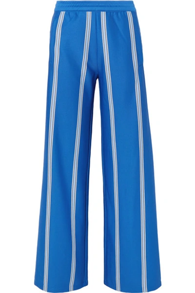 Shop Tory Sport Striped Stretch-knit Wide-leg Track Pants In Blue