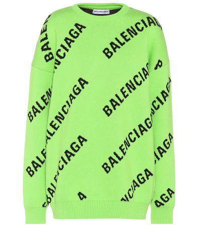 Shop Balenciaga Allover Logo Wool-blend Sweater In Green