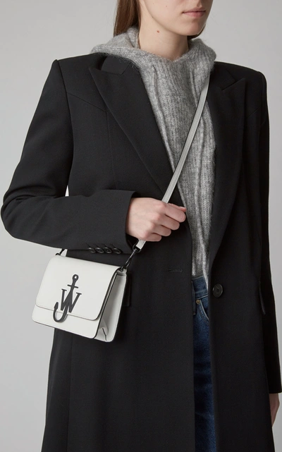 Shop Jw Anderson Logo Mini Leather Shoulder Bag   In Black/white