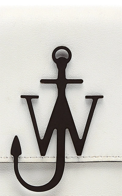 Shop Jw Anderson Logo Mini Leather Shoulder Bag   In Black/white
