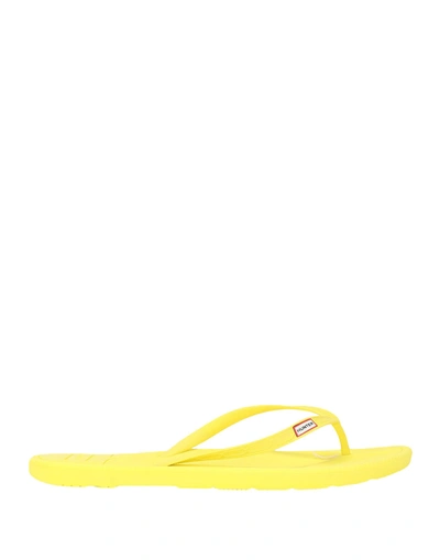 Shop Hunter Flip Flops In Yellow