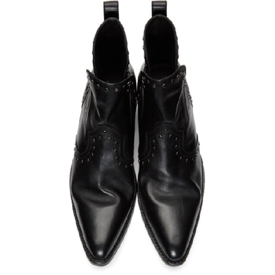 Shop Saint Laurent Black Studded Dakota Chelsea Boots