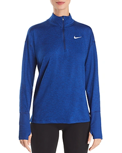 Shop Nike Element Quarter-zip Top In Blue