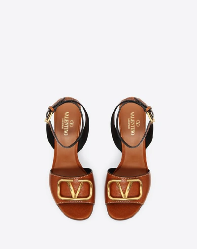 Shop Valentino Garavani Grainy Cowhide Sandal With Vlogo Detail 100mm In Tan
