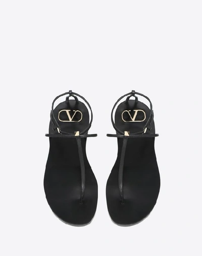 Shop Valentino Garavani Vlogo Flip Flop Sandal With Stud Detail 5mm In Black