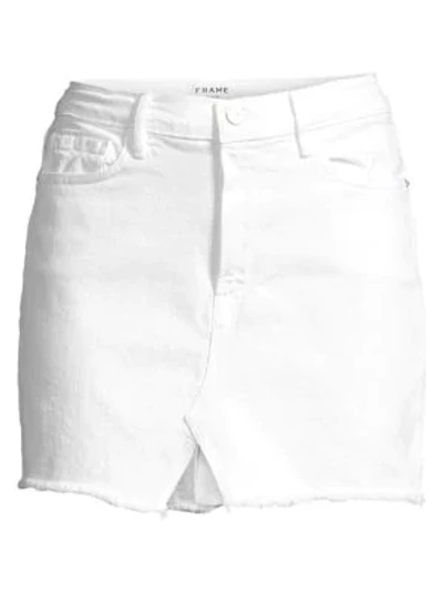 Shop Frame Le Mini Distressed Denim Skirt In Blanc