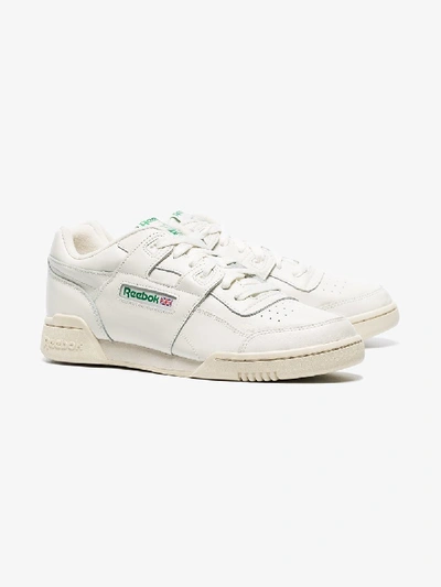 Shop Reebok White Workout Lo Plus Low Top Leather Sneakers In White/green