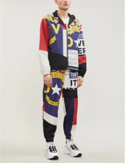 Shop Versace News Hooded Shell Jacket In White Red Blue