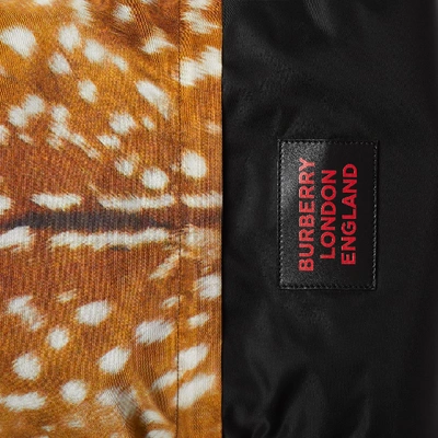 Shop Burberry Deer Print Nylon Drawcord Backpack In Tan/white