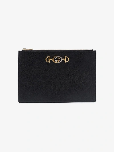 Shop Gucci Black Gg Brooch-embellished Leather Clutch Bag