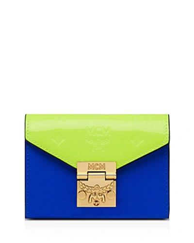Shop Mcm Patricia Patent Leather Trifold Wallet In Neon Yellow/gold
