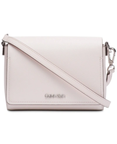 Shop Calvin Klein Clara Leather Crossbody In Powder Pink/silver