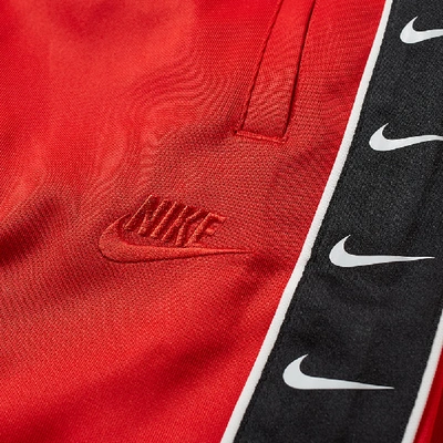 Nike Taped Poly Track Pant In Red | ModeSens