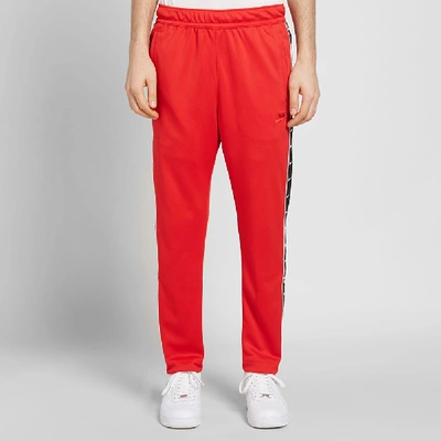 Nike Taped Poly Track Pant In Red | ModeSens