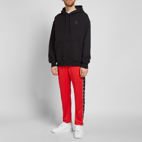 nike taped poly pant red