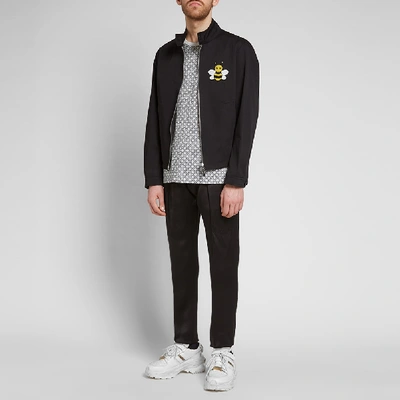 Homme X Kaws Bee Harrington Jacket In Black