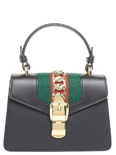 Shop Gucci Mini Sylvie Top Handle Bag In Black