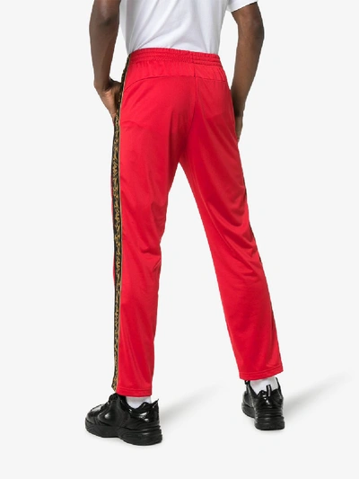 Shop Charm's Flame Logo Stripe Track Pants In Red