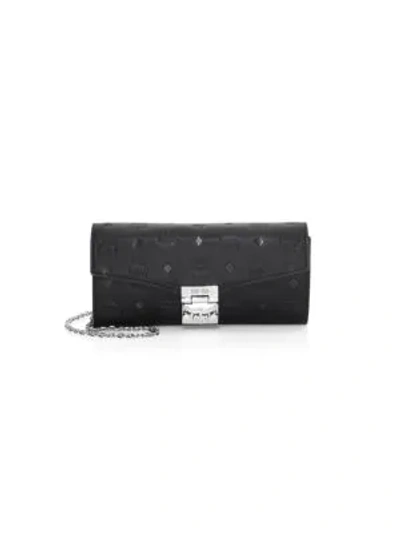Shop Mcm Large Monogram Leather Wallet-on-chain In Black
