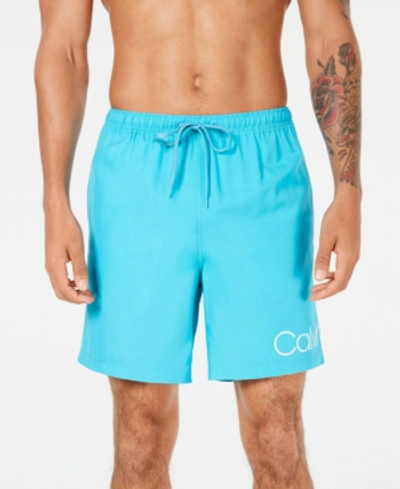 Shop Calvin Klein Men's Logo 7" Volley Swim Trunks, Created For Macy's In Atlantis Blue