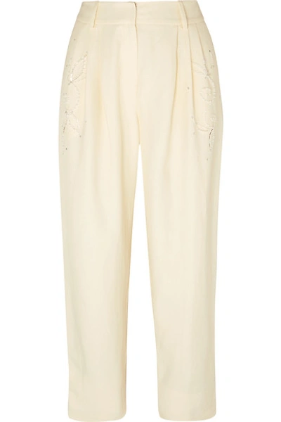Shop Magda Butrym Embellished Pleated Crepe Pants In Cream