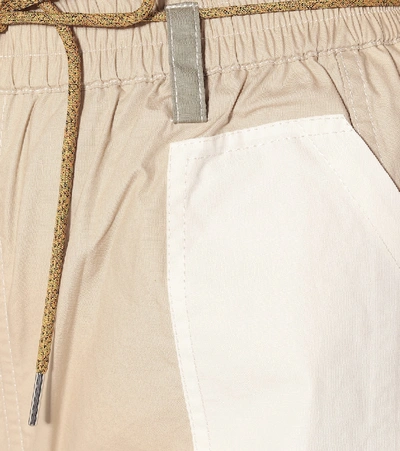 Shop Ganni Wide-leg Cotton Pants In Beige
