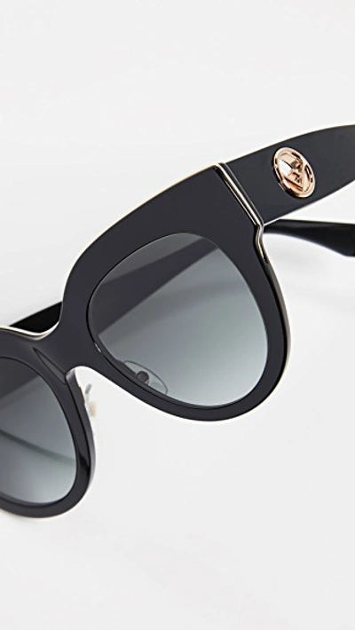 Shop Fendi Round Acetate Sunglasses In Black