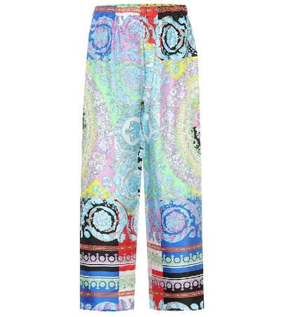 Shop Versace Printed Silk Pants In Multicoloured