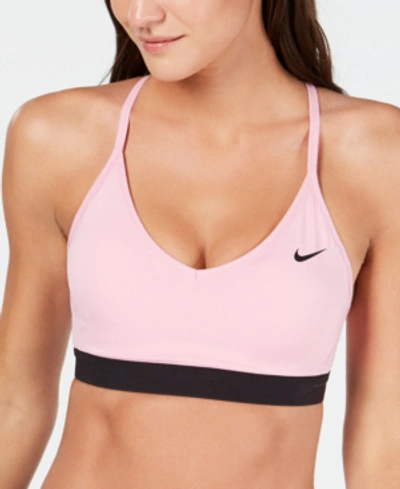 Shop Nike Indy Light-support Compression Sports Bra In Pink Rise/black