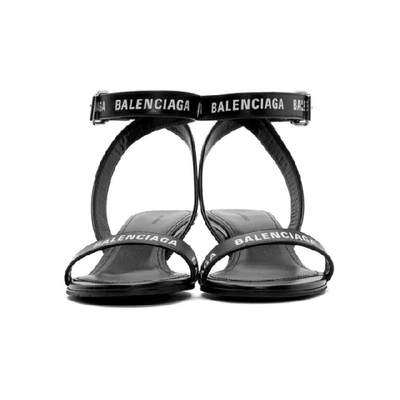 Shop Balenciaga Black Logo Strappy Sandals In 1006 Black