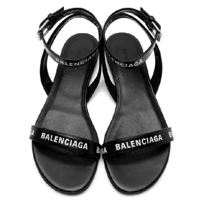 Shop Balenciaga Black Logo Strappy Flat Sandals In 1006 Black