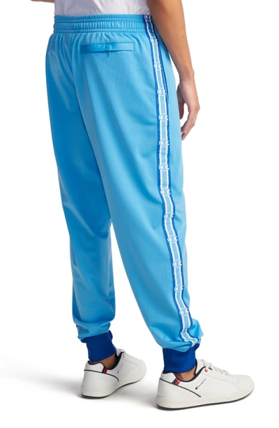 Shop Champion Track Pants In Active Blue/ Surf The Web