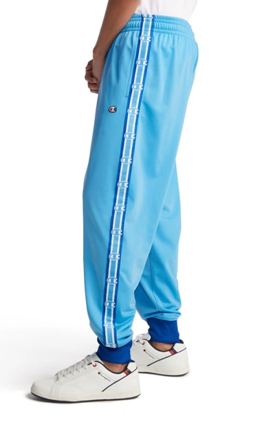Shop Champion Track Pants In Active Blue/ Surf The Web