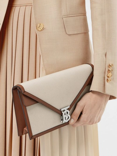 Shop Burberry Small Canvas And Leather Tb Envelope Clutch In Natural