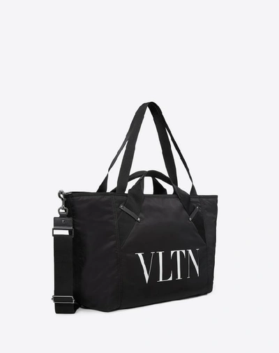 Shop Valentino Garavani Uomo Small Nylon Vltn Travel Bag In Black