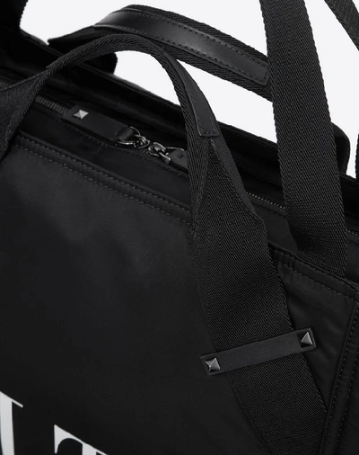 Shop Valentino Garavani Uomo Small Nylon Vltn Travel Bag In Black