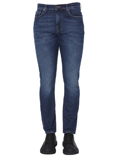 Shop Versace Slim Fit Jeans In Blu