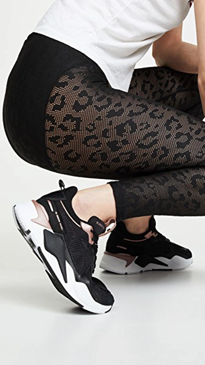 Shop Puma Rs-x Trophy Sneakers In  Black/rose Gold