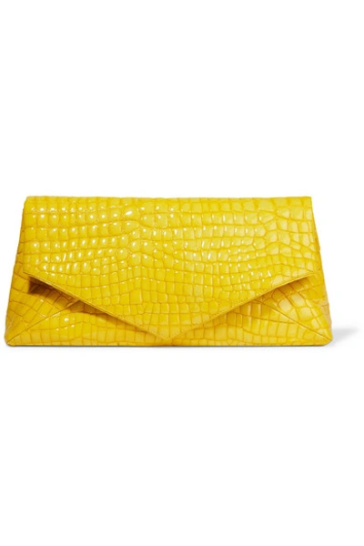 Shop Dries Van Noten Glossed Croc-effect Leather Clutch In Yellow
